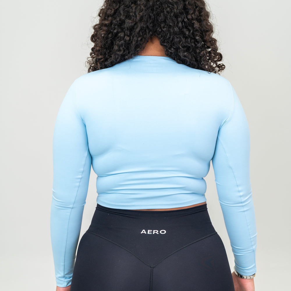 
                      
                        Baby-Blue Cropped Seamless Long-Sleeve
                      
                    